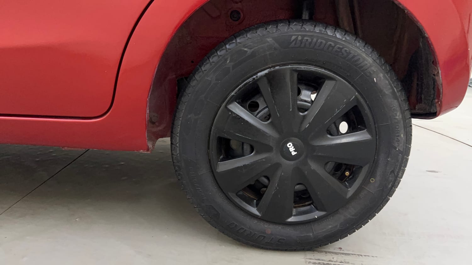 Used 2015 Maruti Suzuki Celerio VXi AMT Petrol Automatic tyres LEFT REAR TYRE RIM VIEW