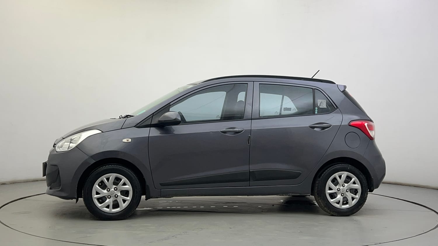 Used 2019 Hyundai Grand i10 Magna 1.2 Kappa VTVT Petrol Manual exterior LEFT SIDE VIEW
