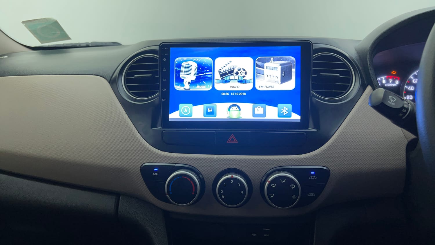 Used 2019 Hyundai Grand i10 Magna 1.2 Kappa VTVT Petrol Manual interior MUSIC SYSTEM & AC CONTROL VIEW