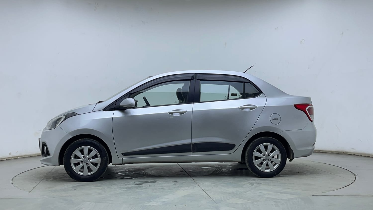 Used 2015 Hyundai Xcent S 1.2 (O) Petrol Manual exterior LEFT SIDE VIEW