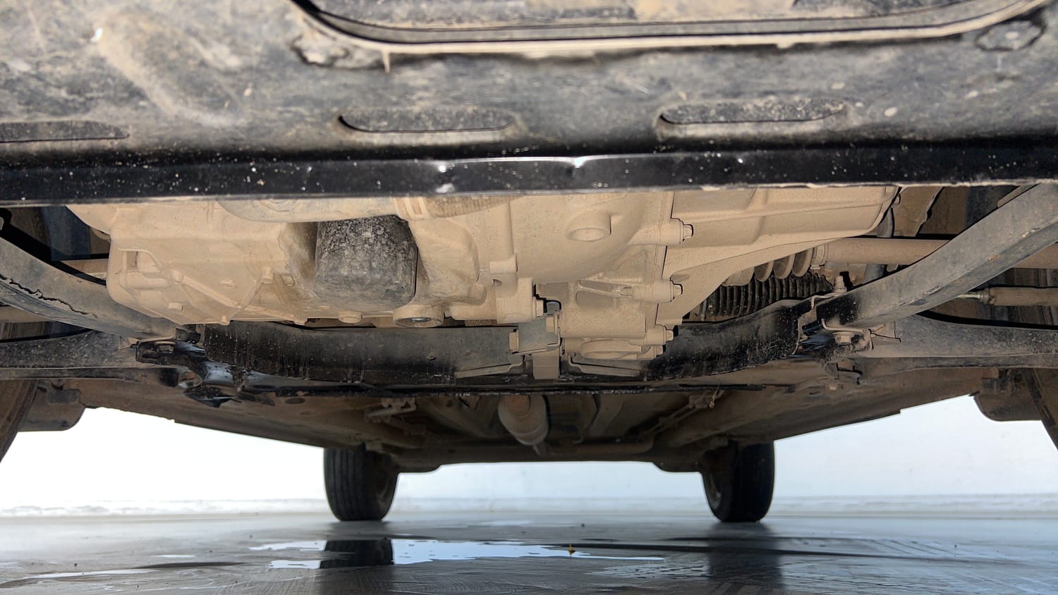 Used 2024 Nissan Magnite XE AMT Petrol Automatic extra FRONT LEFT UNDERBODY VIEW