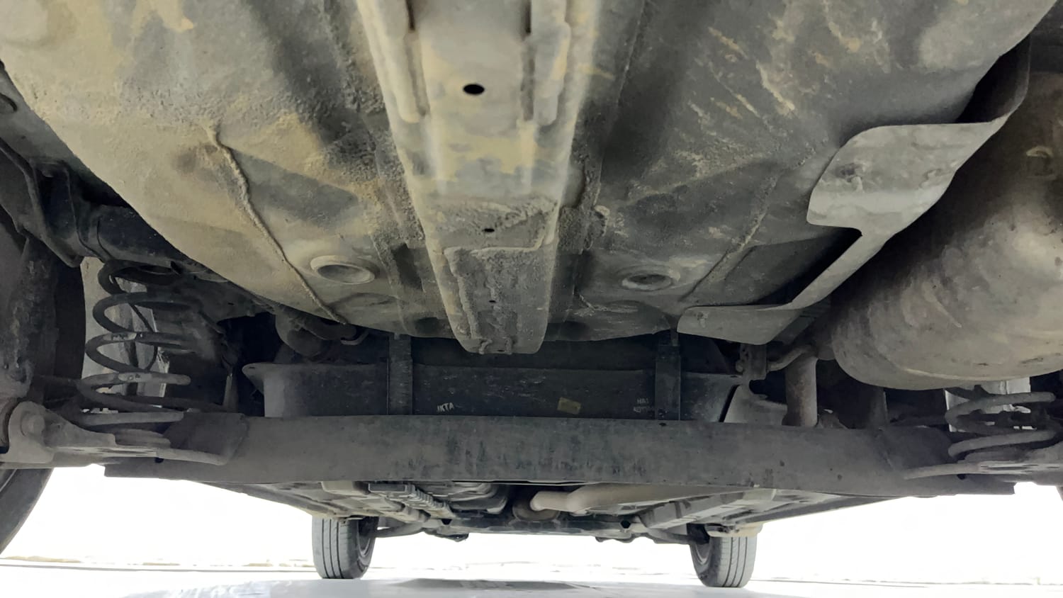 Used 2015 Hyundai Xcent S 1.2 (O) Petrol Manual extra REAR UNDERBODY VIEW (TAKEN FROM REAR)