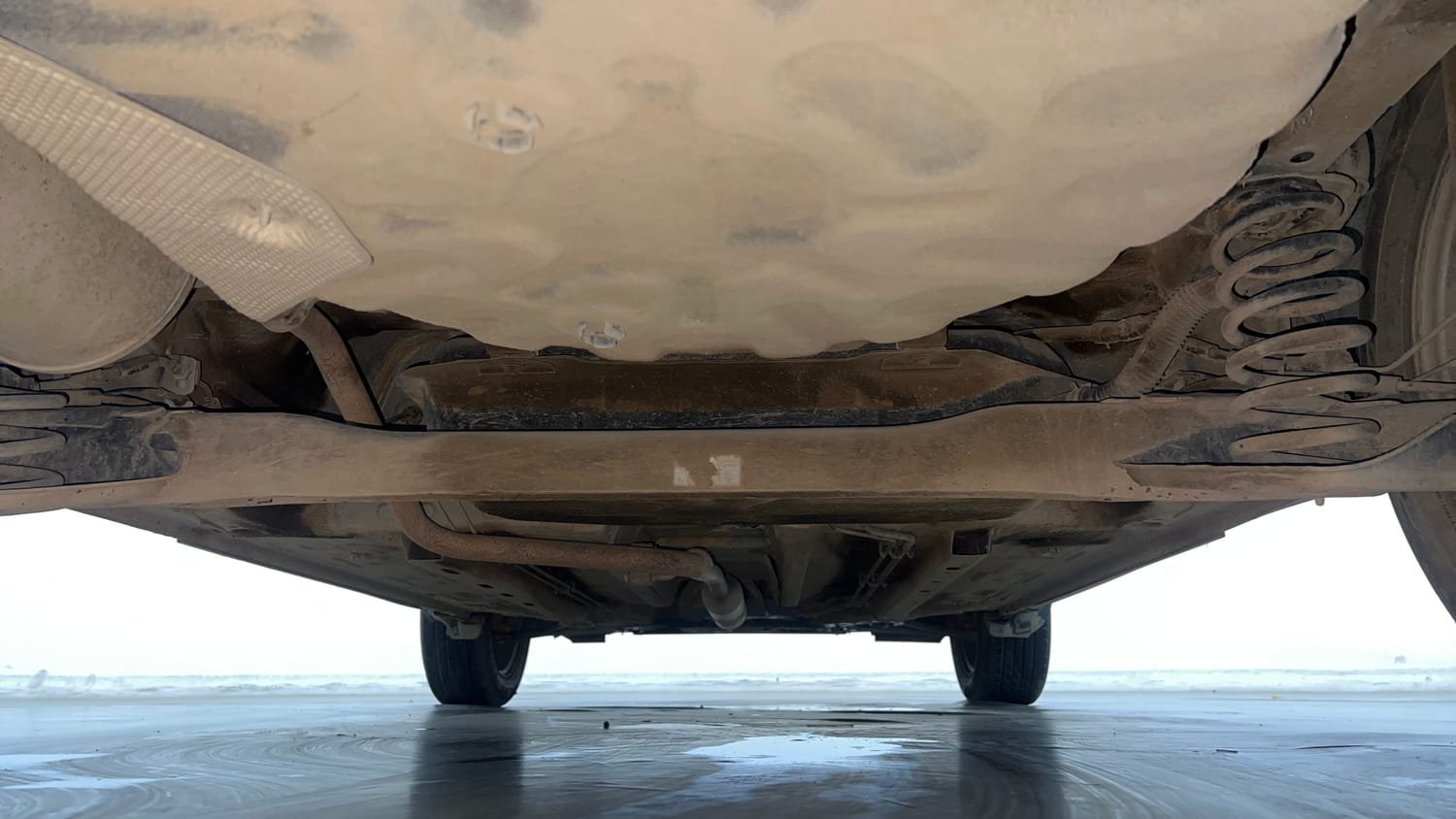 Used 2024 Nissan Magnite XE AMT Petrol Automatic extra REAR UNDERBODY VIEW (TAKEN FROM REAR)
