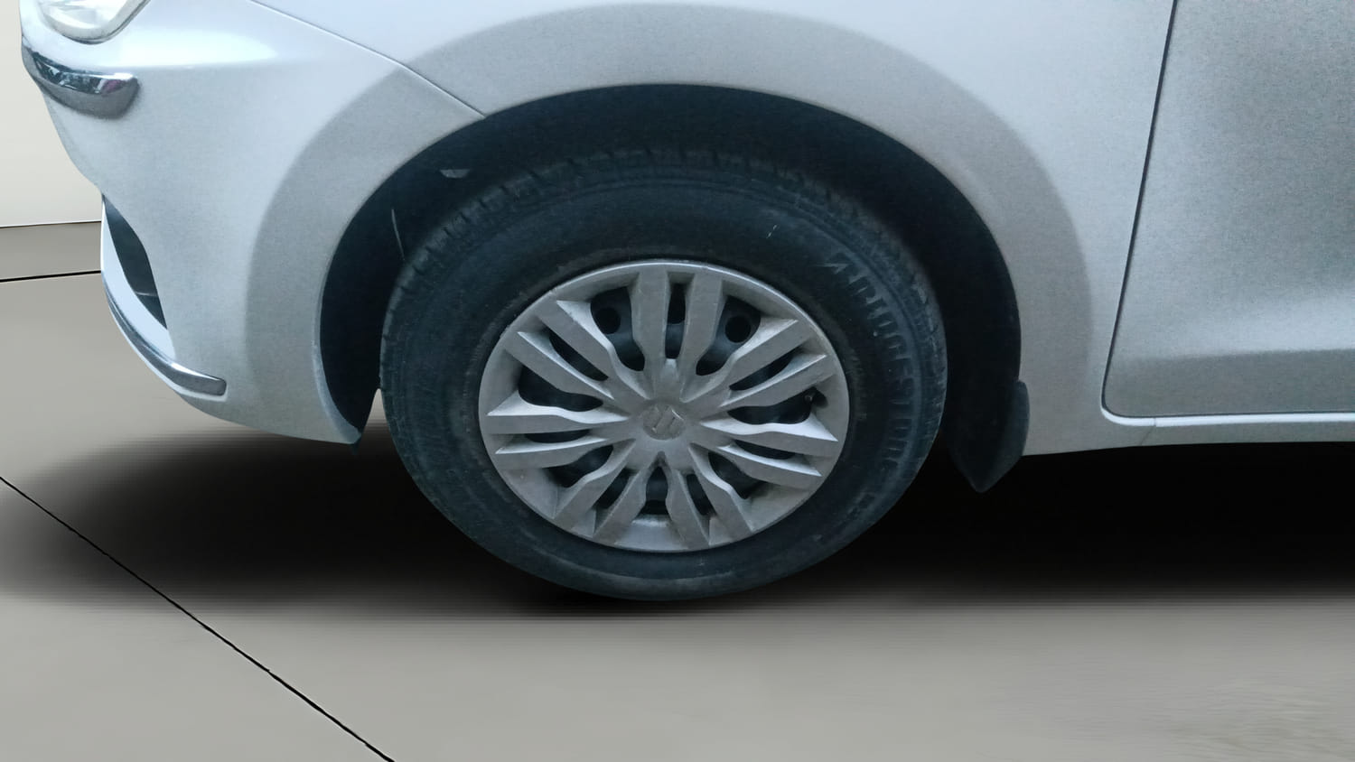 Used 2018 Maruti Suzuki Dzire VDi AMT Diesel Automatic tyres LEFT FRONT TYRE RIM VIEW