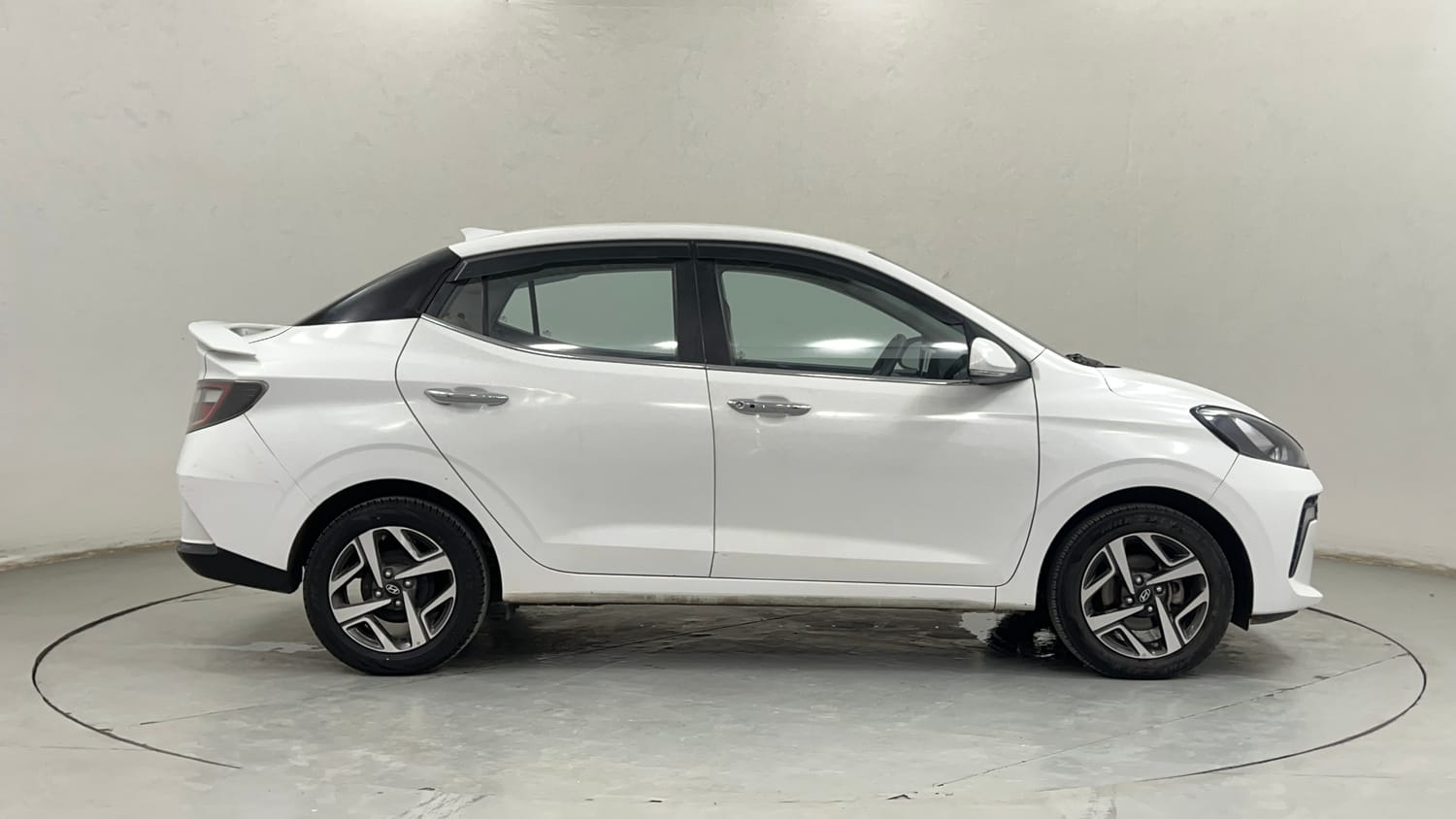 Used 2023 Hyundai Aura SX 1.2 CNG Cng Manual exterior RIGHT SIDE VIEW