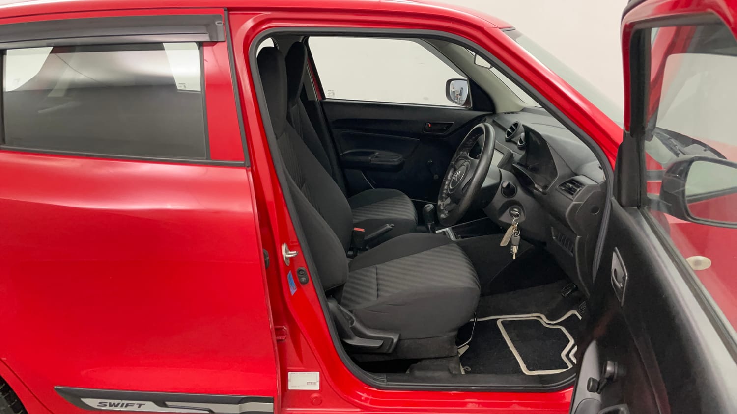Used 2019 Maruti Suzuki Swift LXi Petrol Manual interior RIGHT SIDE FRONT DOOR CABIN VIEW