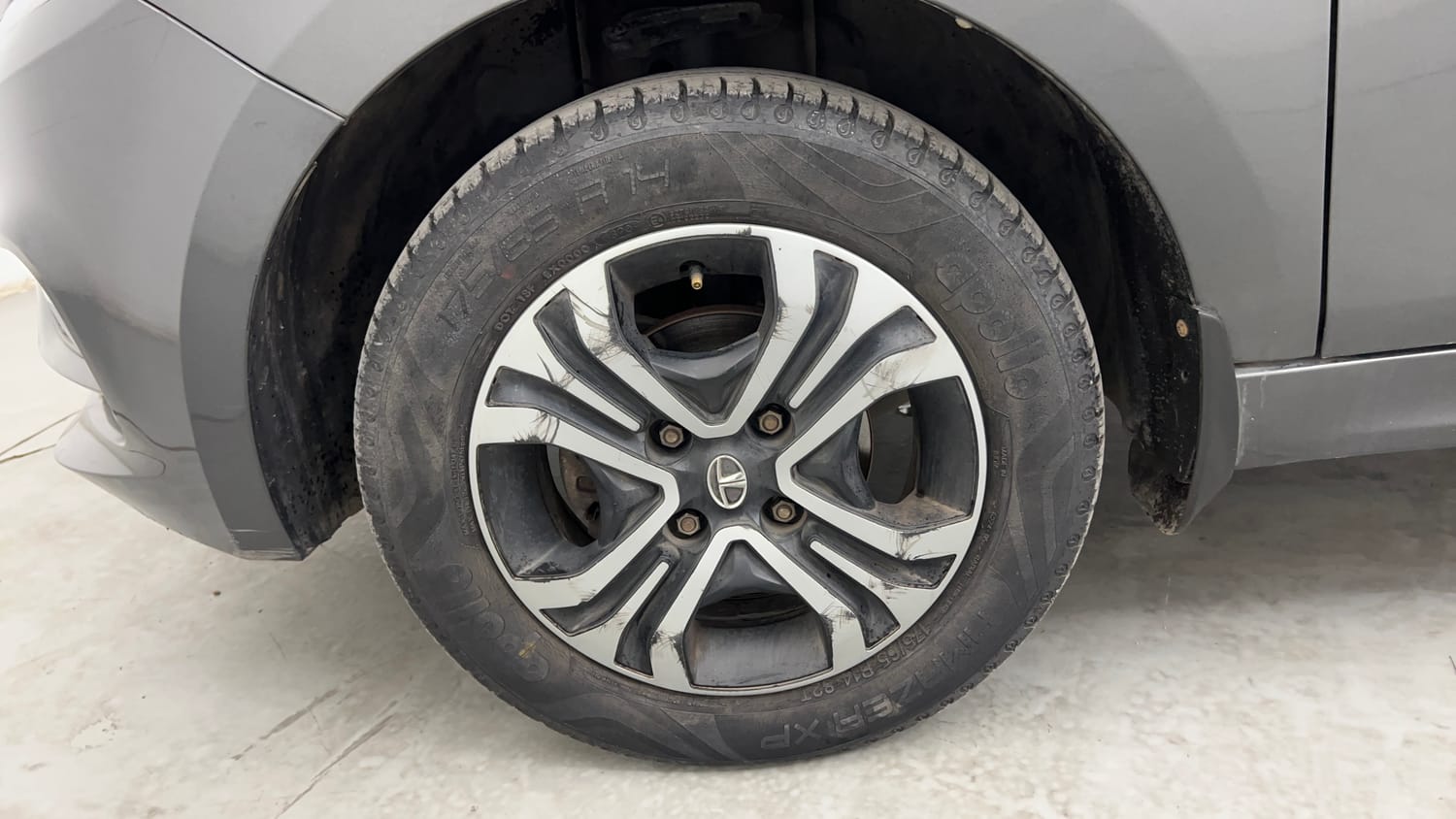 Used 2020 Tata Tiago Revotron XZ Petrol Manual tyres LEFT FRONT TYRE RIM VIEW