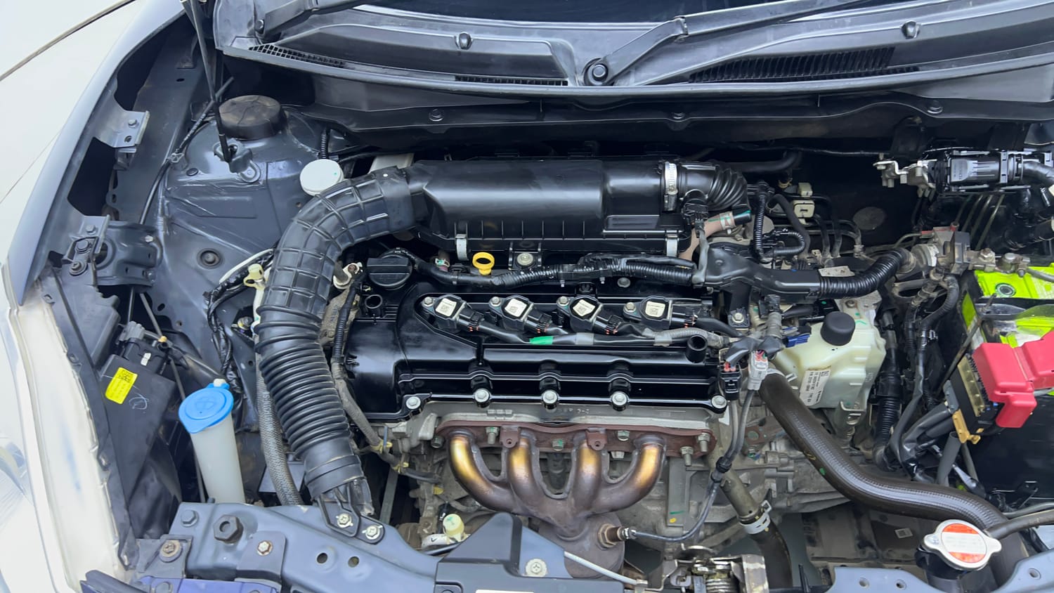 Used 2019 Maruti Suzuki Swift VXi AMT Petrol Automatic engine ENGINE RIGHT SIDE VIEW