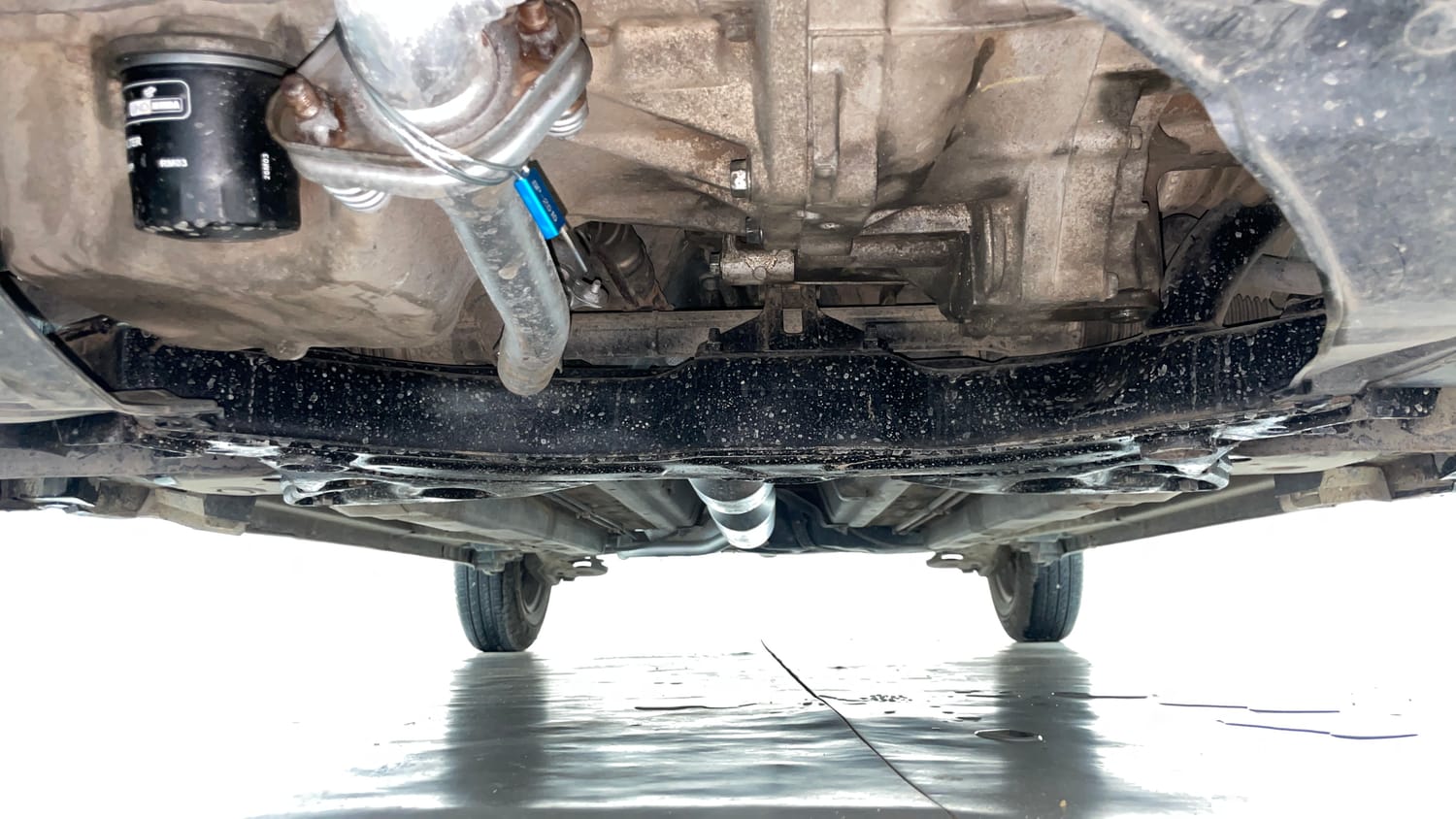 Used 2015 Maruti Suzuki Swift Dzire VXI Petrol Manual extra FRONT LEFT UNDERBODY VIEW