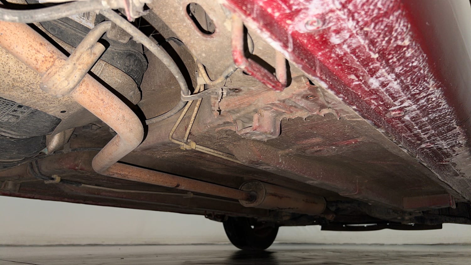 Used 2015 Maruti Suzuki Celerio VXi AMT Petrol Automatic extra REAR RIGHT UNDERBODY VIEW