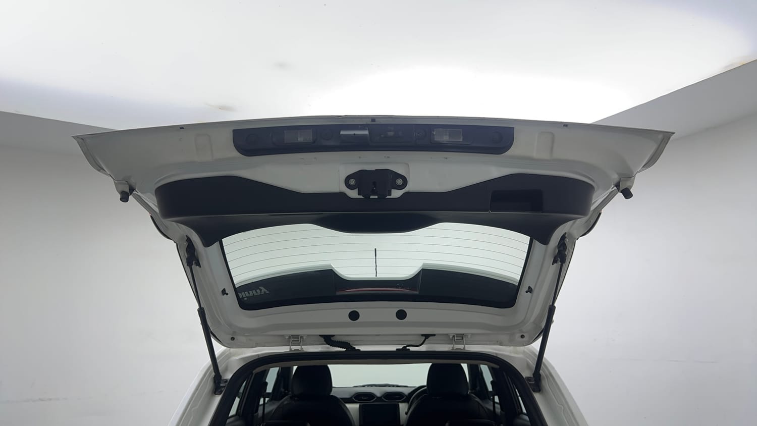Used 2022 Nissan Magnite XE Petrol Manual interior DICKY DOOR OPEN VIEW