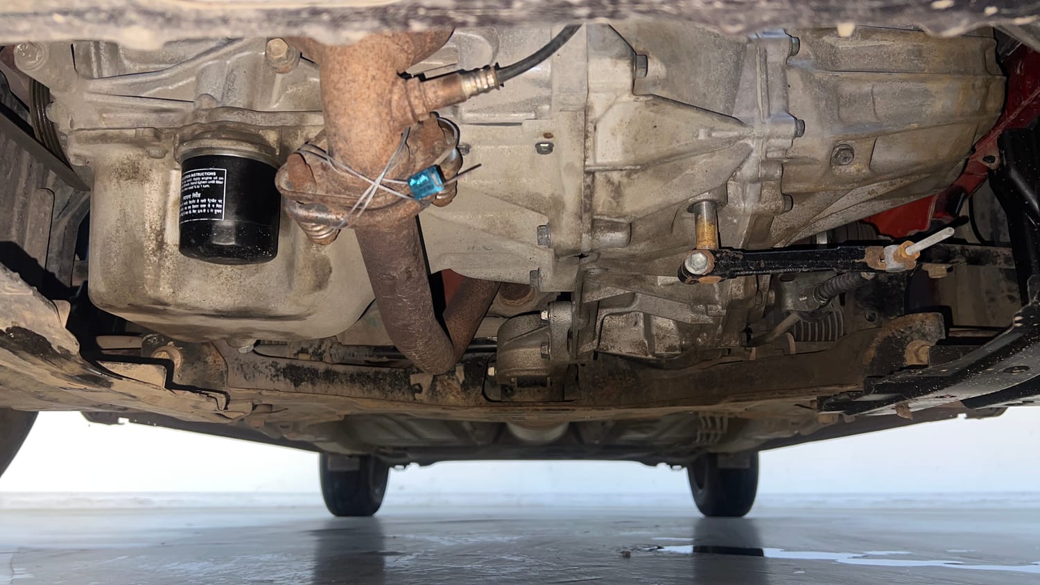 Used 2015 Maruti Suzuki Baleno Delta 1.2 Petrol Manual extra FRONT LEFT UNDERBODY VIEW