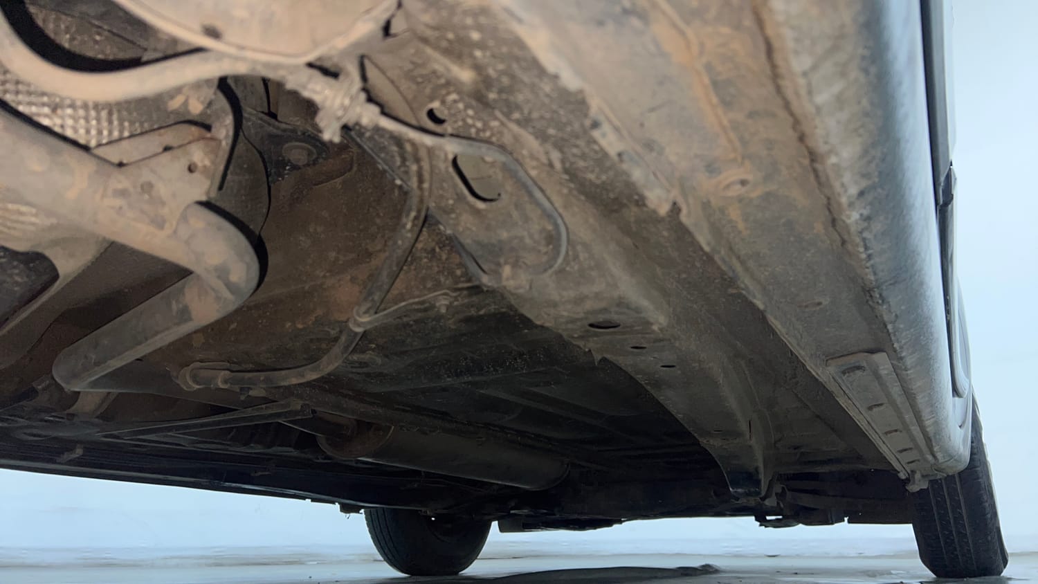 Used 2019 Maruti Suzuki Dzire VXi AMT Petrol Automatic extra REAR RIGHT UNDERBODY VIEW