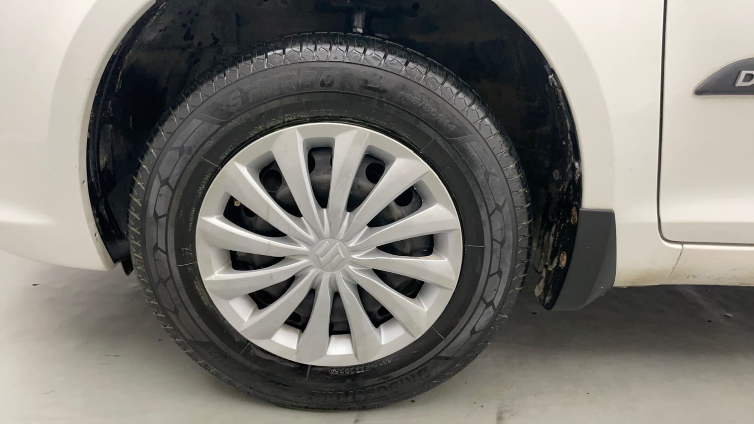 Used 2015 Maruti Suzuki Swift Dzire VXI Petrol Manual tyres LEFT FRONT TYRE RIM VIEW