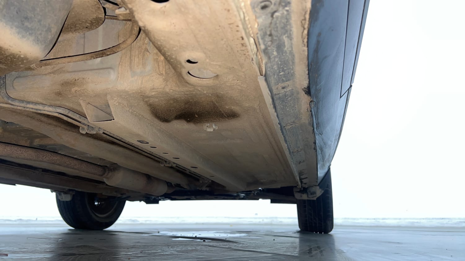 Used 2024 Nissan Magnite XE AMT Petrol Automatic extra REAR RIGHT UNDERBODY VIEW