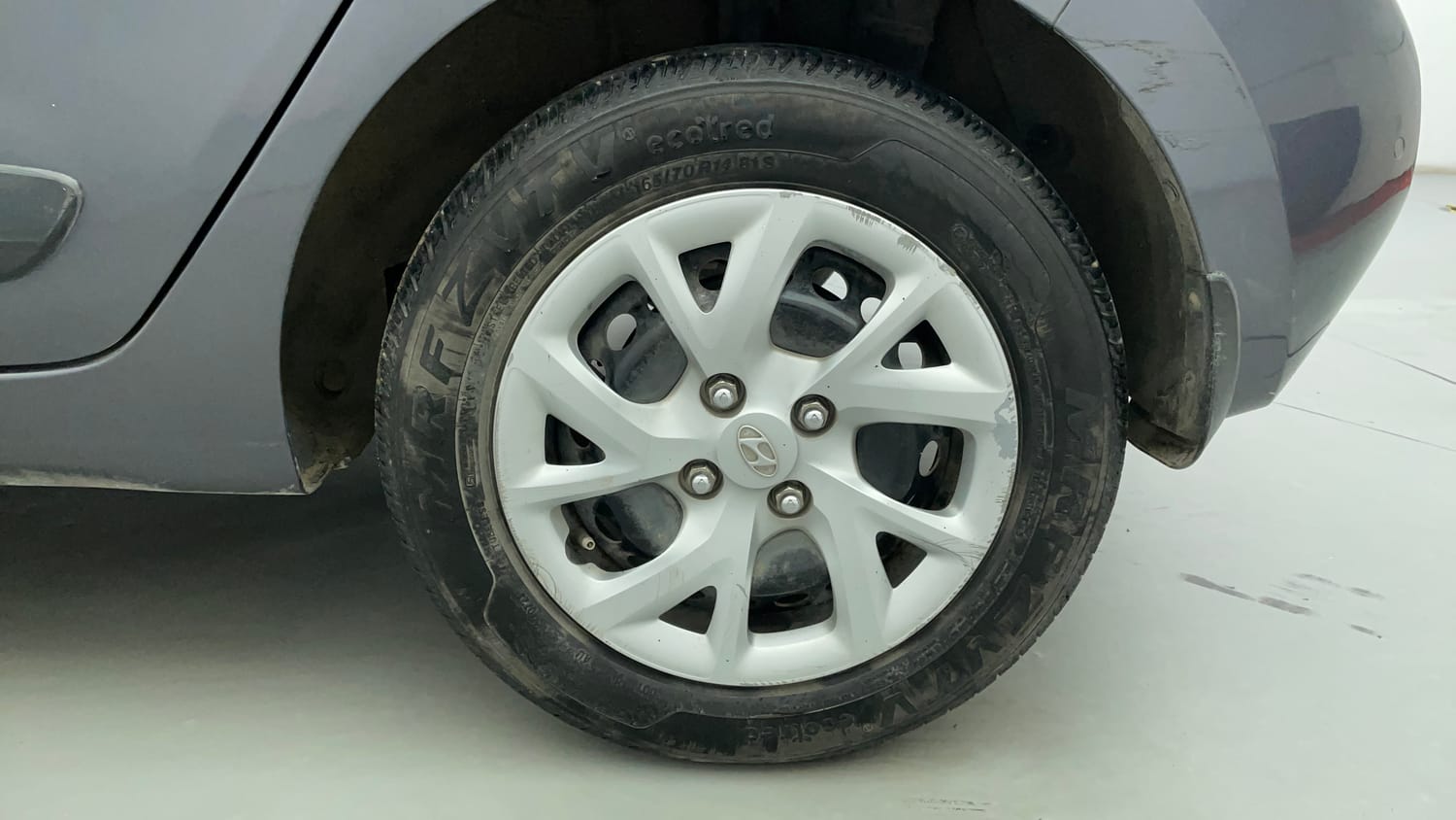 Used 2019 Hyundai Grand i10 Sportz 1.2 Kappa VTVT Petrol Manual tyres LEFT REAR TYRE RIM VIEW
