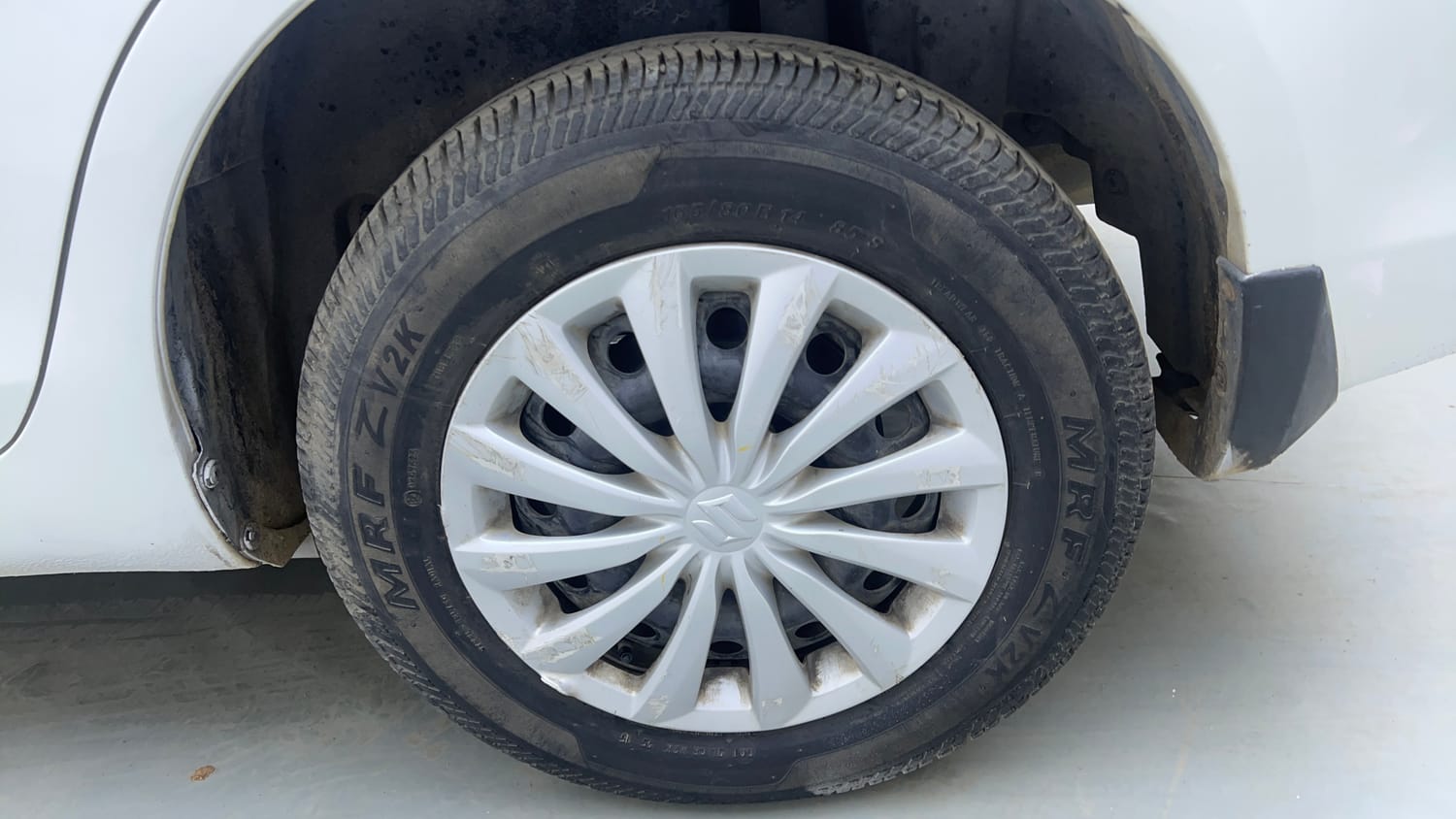 Used 2015 Maruti Suzuki Swift Dzire VXI Petrol Manual tyres LEFT REAR TYRE RIM VIEW