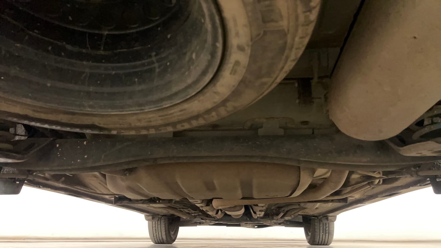 Used 2023 Kia Carens Luxury Plus 1.4 Petrol 7 STR Petrol Manual extra REAR UNDERBODY VIEW (TAKEN FROM REAR)