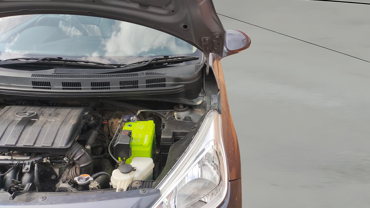 Used 2018 Hyundai Grand i10 Sportz 1.2 Kappa VTVT Petrol Manual engine ENGINE LEFT SIDE HINGE & APRON VIEW
