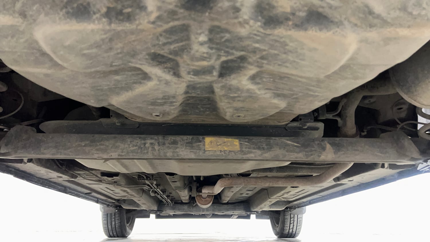 Used 2022 Tata Punch Adventure Rhythm Pack MT Petrol Manual extra REAR UNDERBODY VIEW (TAKEN FROM REAR)