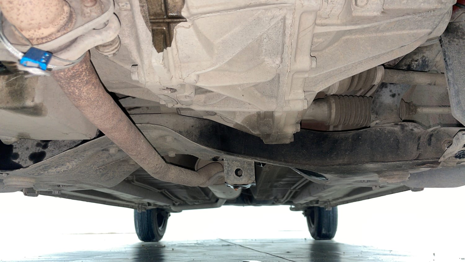 Used 2015 Maruti Suzuki Celerio VXi AMT Petrol Automatic extra FRONT LEFT UNDERBODY VIEW