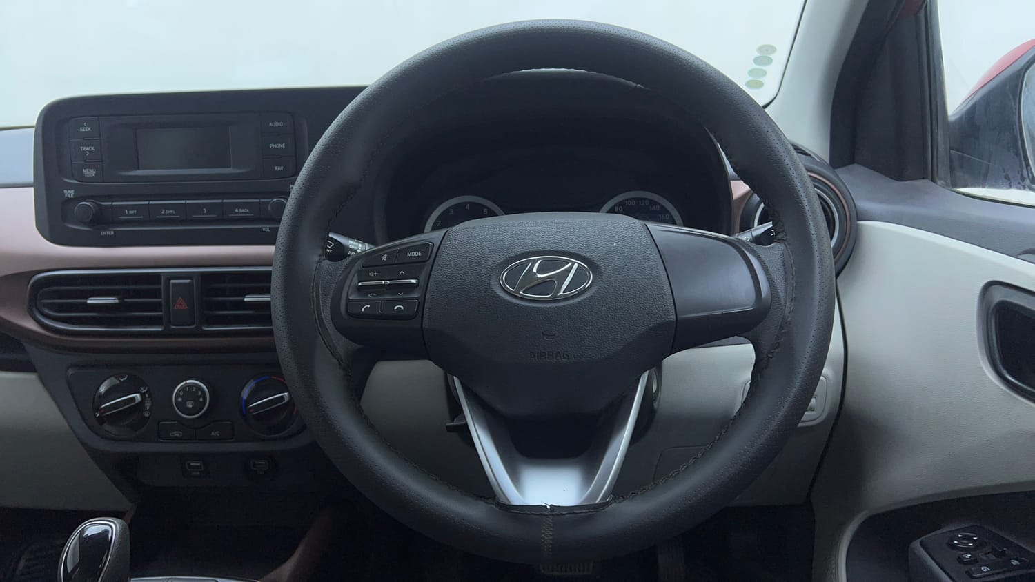 Used 2022 Hyundai Aura S 1.2 AMT Petrol Petrol Automatic top_features Steering mounted controls