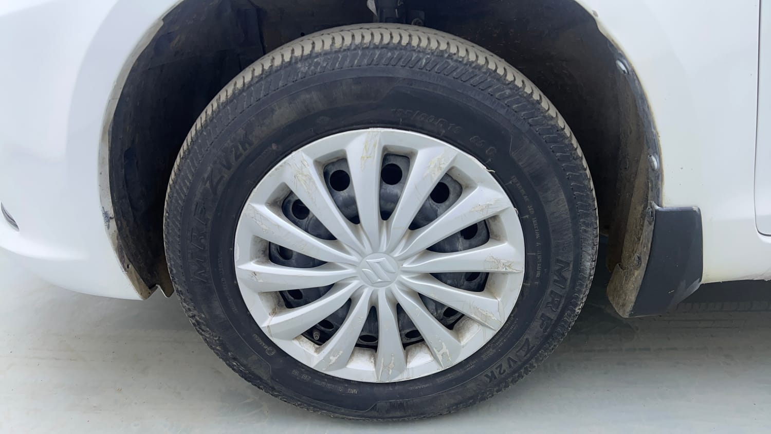 Used 2015 Maruti Suzuki Swift Dzire VXI Petrol Manual tyres LEFT FRONT TYRE RIM VIEW