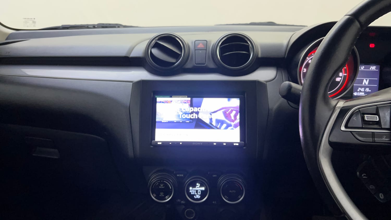 Used 2018 Maruti Suzuki Swift ZXi AMT Petrol Automatic top_features Integrated (in-dash) music system