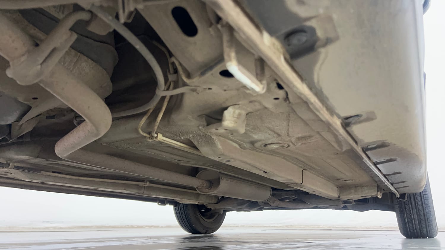 Used 2019 Maruti Suzuki Celerio X Zxi (O) AMT Petrol Automatic extra REAR RIGHT UNDERBODY VIEW