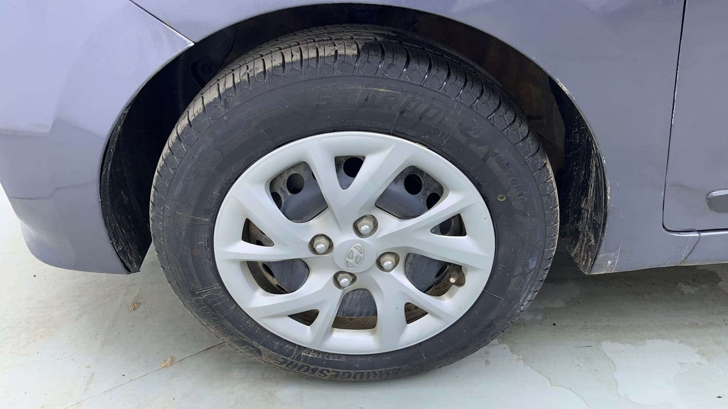 Used 2019 Hyundai Grand i10 Sportz 1.2 Kappa VTVT Petrol Manual tyres LEFT FRONT TYRE RIM VIEW
