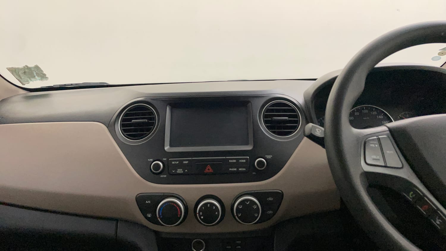 Used 2018 Hyundai Grand i10 Sportz AT 1.2 Kappa VTVT Petrol Automatic interior MUSIC SYSTEM & AC CONTROL VIEW