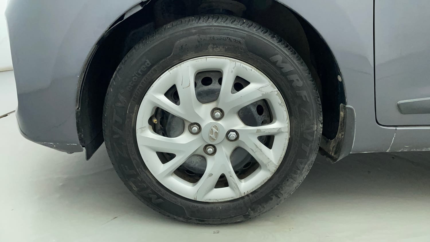 Used 2019 Hyundai Grand i10 Sportz 1.2 Kappa VTVT Petrol Manual tyres LEFT FRONT TYRE RIM VIEW