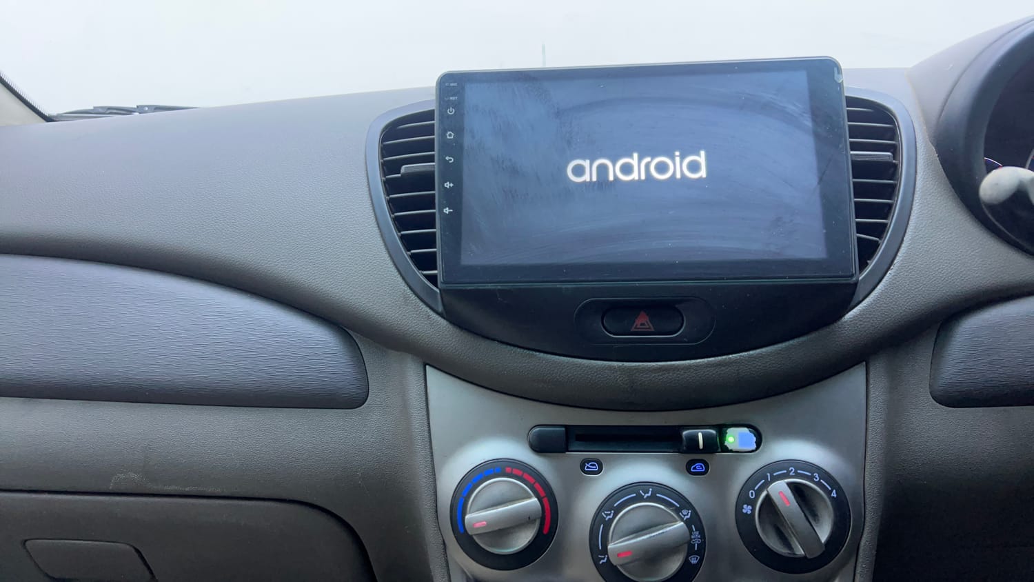 Used 2015 Hyundai i10 Sportz 1.1 iRDE2 Petrol Manual interior MUSIC SYSTEM & AC CONTROL VIEW