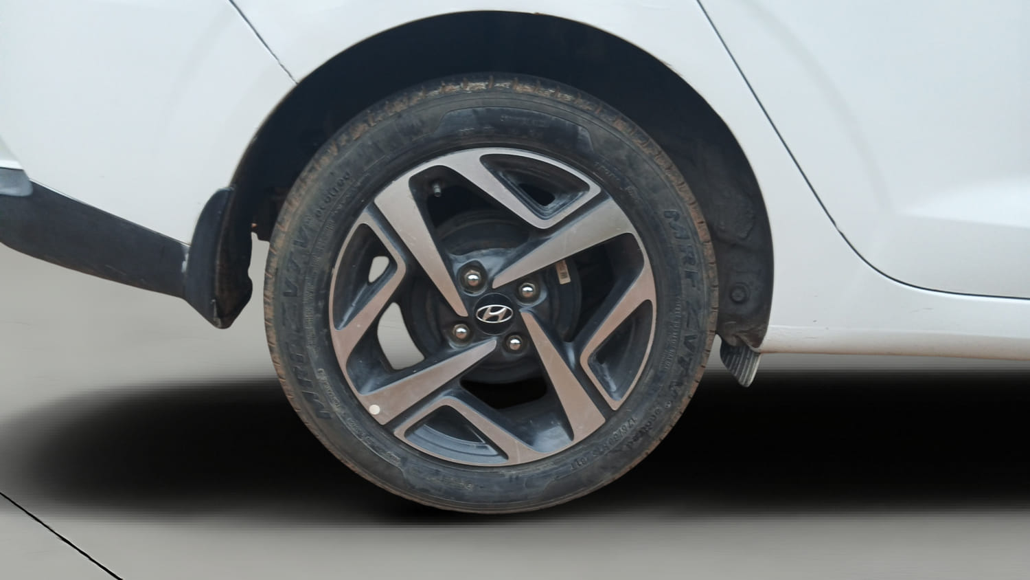 Used 2020 Hyundai Aura SX 1.2 Petrol Petrol Manual tyres RIGHT REAR TYRE RIM VIEW