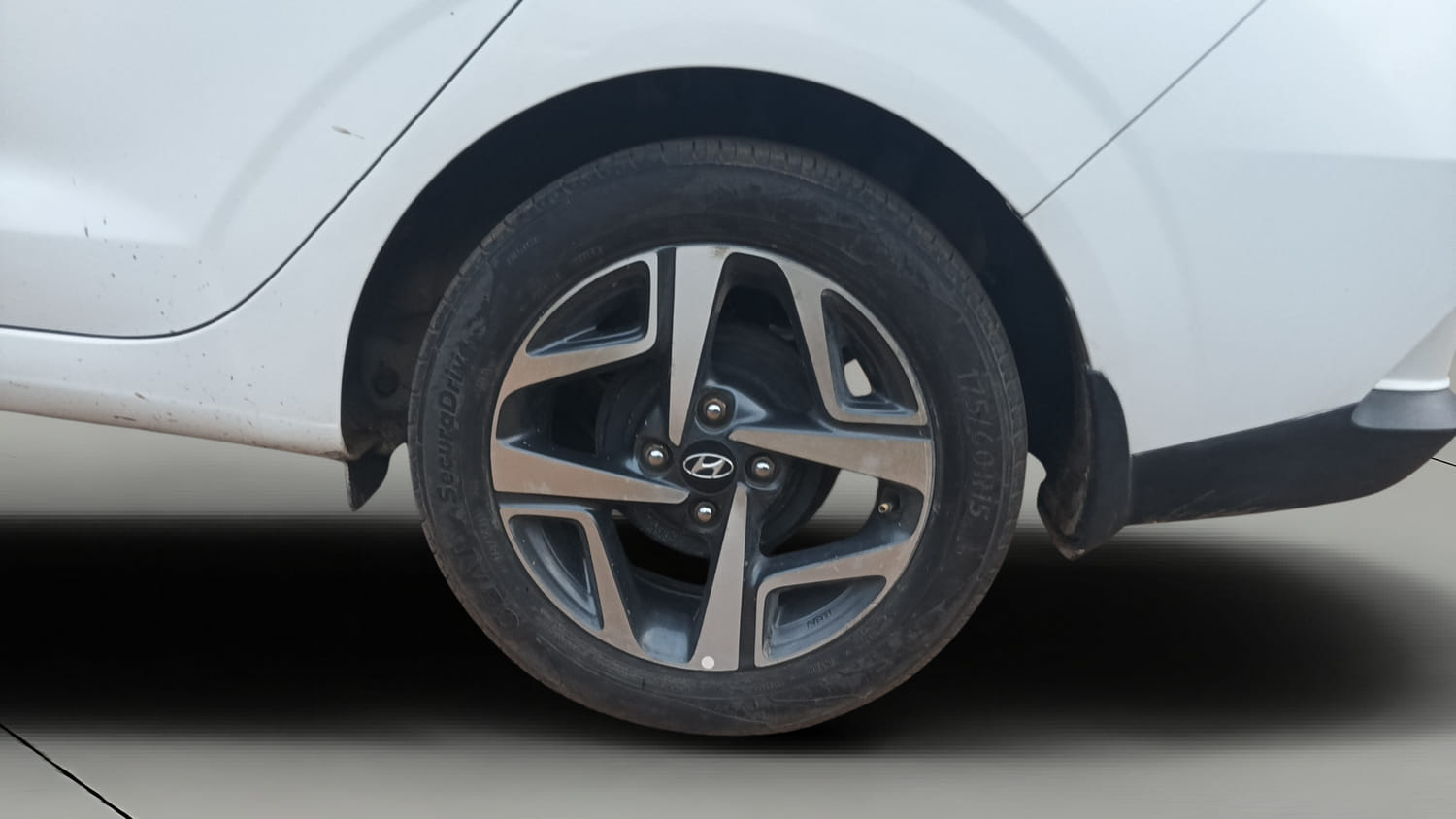 Used 2020 Hyundai Aura SX 1.2 Petrol Petrol Manual tyres LEFT REAR TYRE RIM VIEW