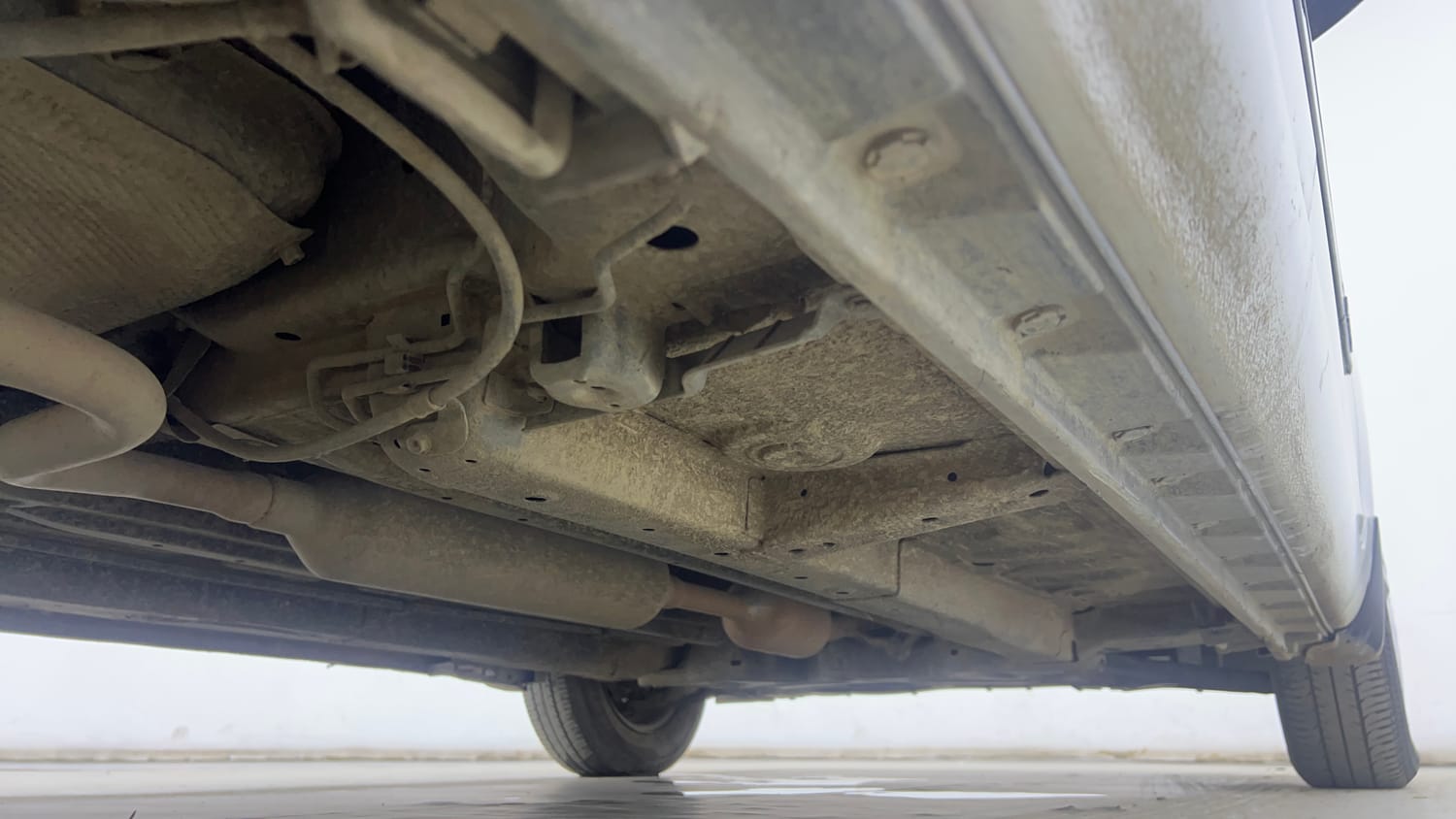 Used 2015 Maruti Suzuki Swift Dzire VXI Petrol Manual extra REAR RIGHT UNDERBODY VIEW