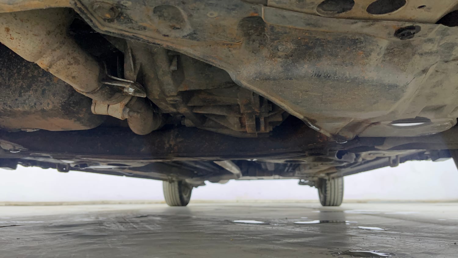 Used 2015 Maruti Suzuki Ertiga ZDI SHVS Diesel Manual extra FRONT LEFT UNDERBODY VIEW