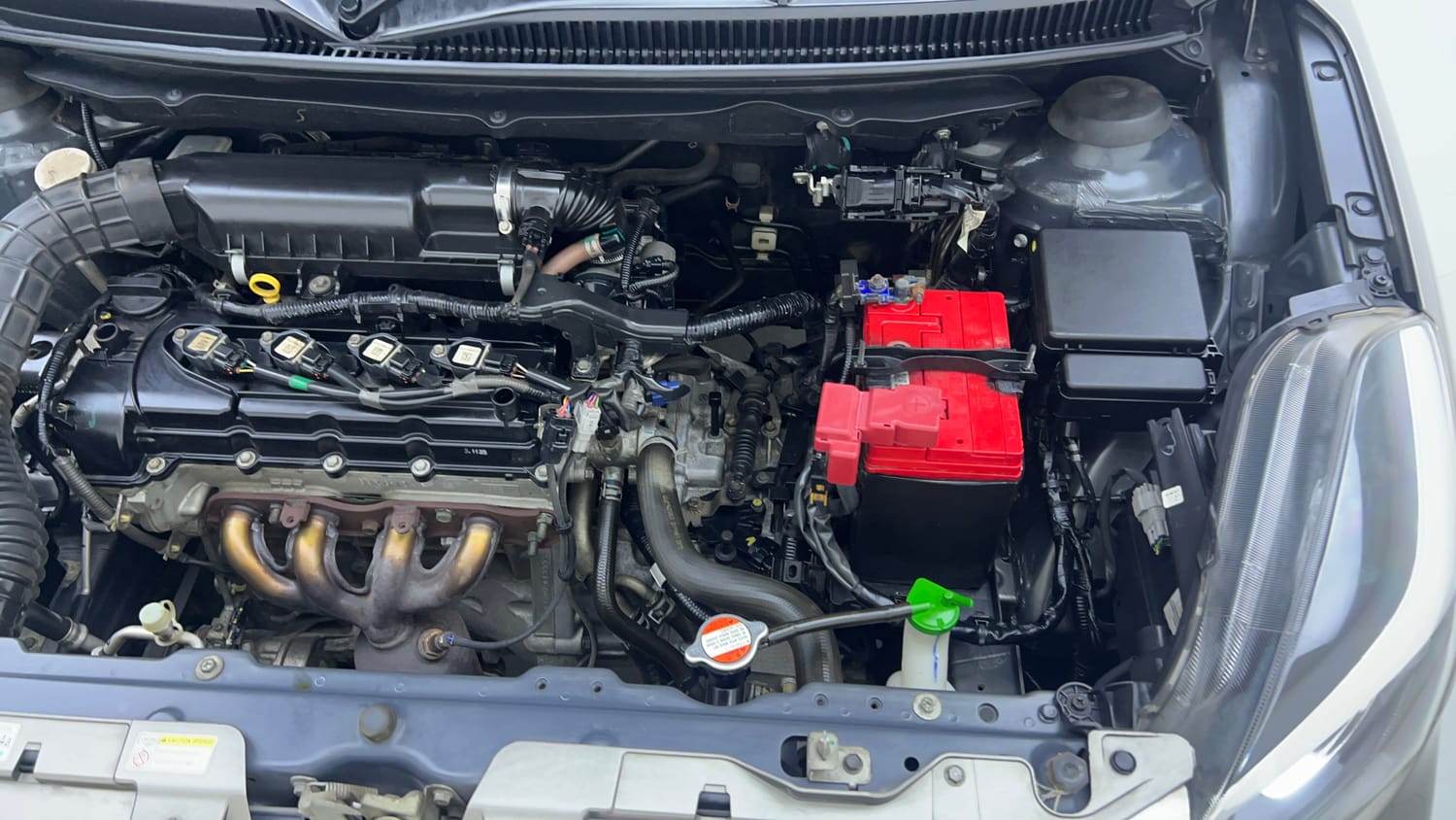 Used 2021 Toyota Glanza V CVT Petrol Automatic engine ENGINE LEFT SIDE VIEW