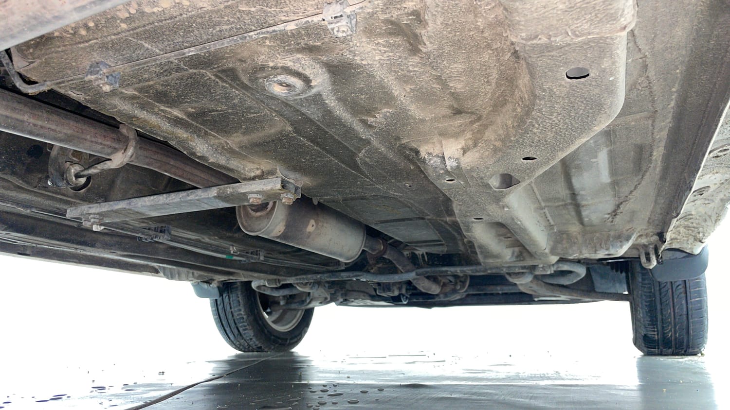 Used 2016 Tata Tiago Revotron XZ Petrol Manual extra REAR RIGHT UNDERBODY VIEW