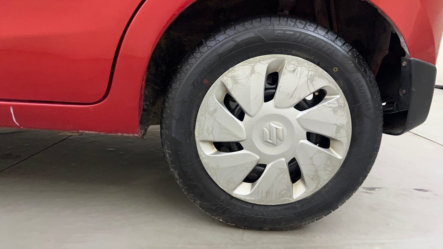 Used 2015 Maruti Suzuki Celerio VXi AMT Petrol Automatic tyres LEFT REAR TYRE RIM VIEW