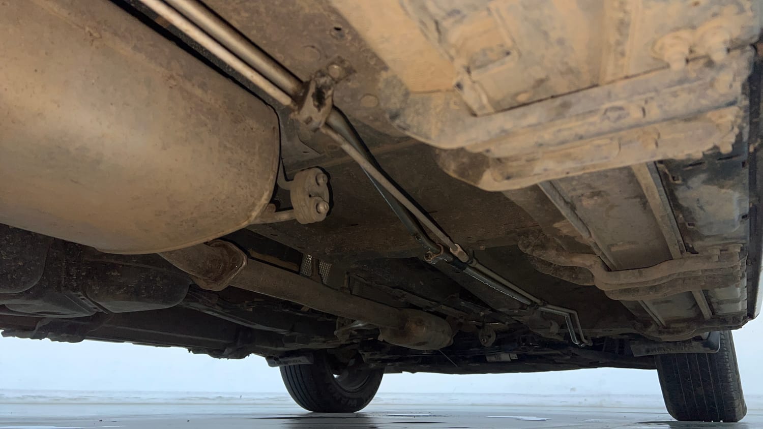 Used 2024 Mahindra XUV700 AX 7 Luxury Pack Diesel MT 7 STR Diesel Manual extra REAR RIGHT UNDERBODY VIEW