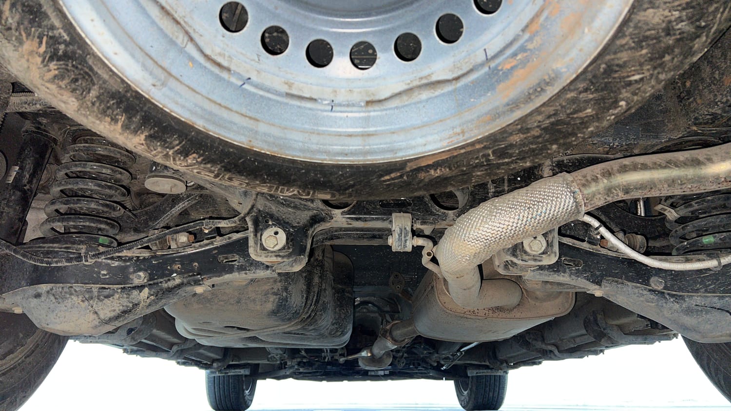Used 2024 Mahindra XUV700 AX 7 Luxury Pack Diesel MT 7 STR Diesel Manual extra REAR UNDERBODY VIEW (TAKEN FROM REAR)