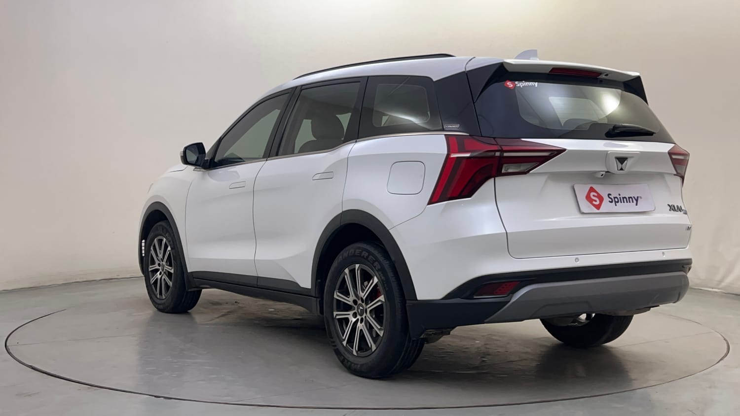 Used 2024 Mahindra XUV700 AX 7 Petrol AT 7 STR Petrol Automatic exterior LEFT REAR CORNER VIEW