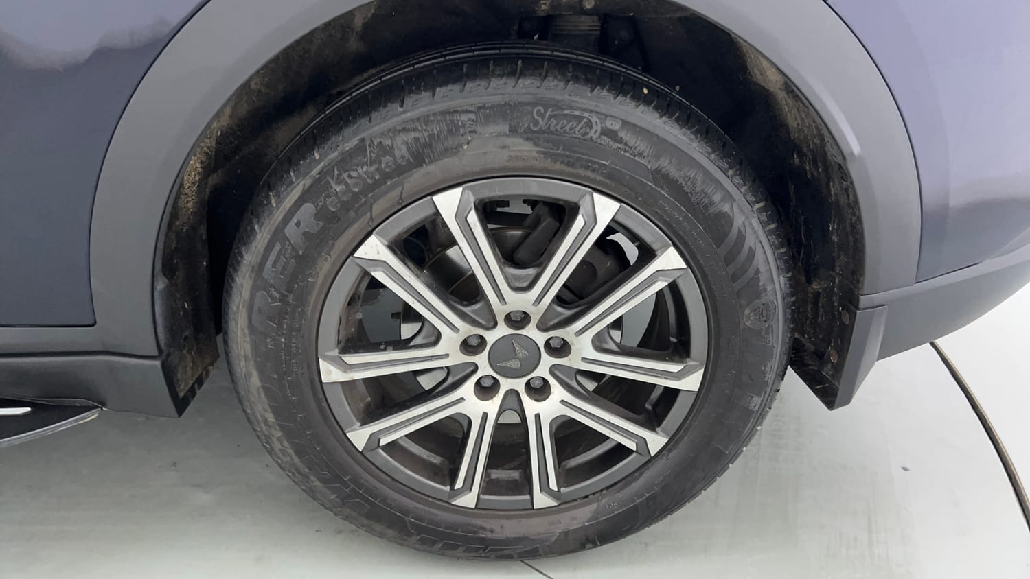 Used 2024 Mahindra XUV700 AX 7 Luxury Pack Diesel MT 7 STR Diesel Manual tyres LEFT REAR TYRE RIM VIEW