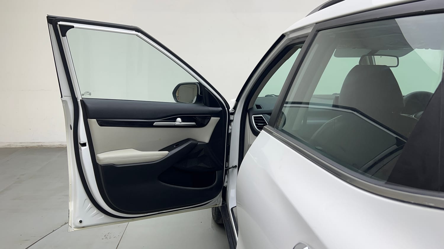 Used 2023 Kia Seltos HTX 1.5 Petrol Manual interior LEFT FRONT DOOR OPEN VIEW