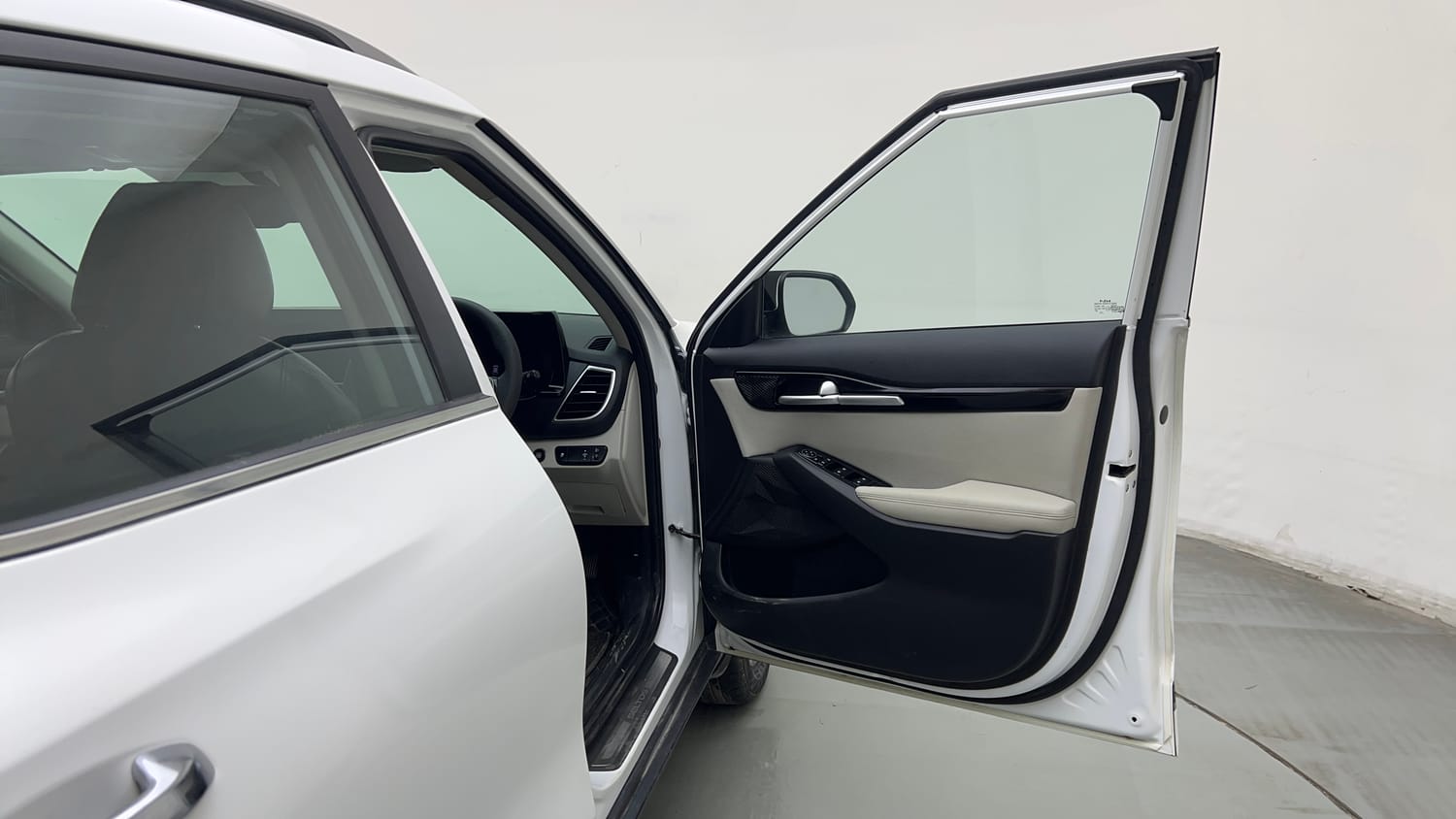 Used 2023 Kia Seltos HTX 1.5 Petrol Manual interior RIGHT FRONT DOOR OPEN VIEW
