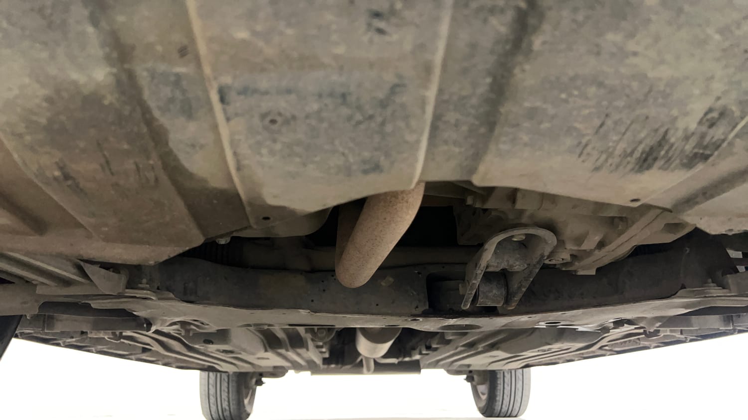 Used 2022 Maruti Suzuki Brezza Zxi Plus AT Dual Tone Petrol Automatic extra FRONT LEFT UNDERBODY VIEW