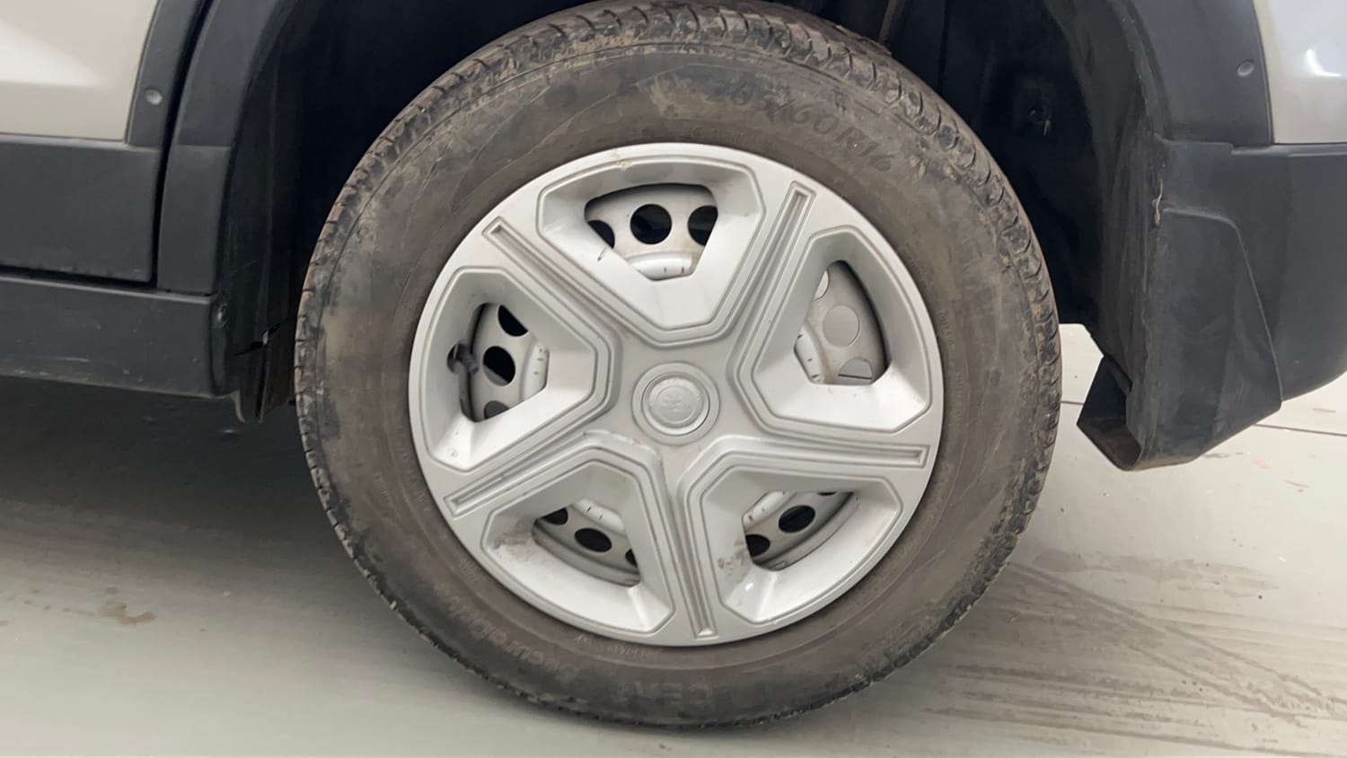 Used 2022 maruti-suzuki Vitara Brezza LXi Petrol Manual tyres LEFT REAR TYRE RIM VIEW