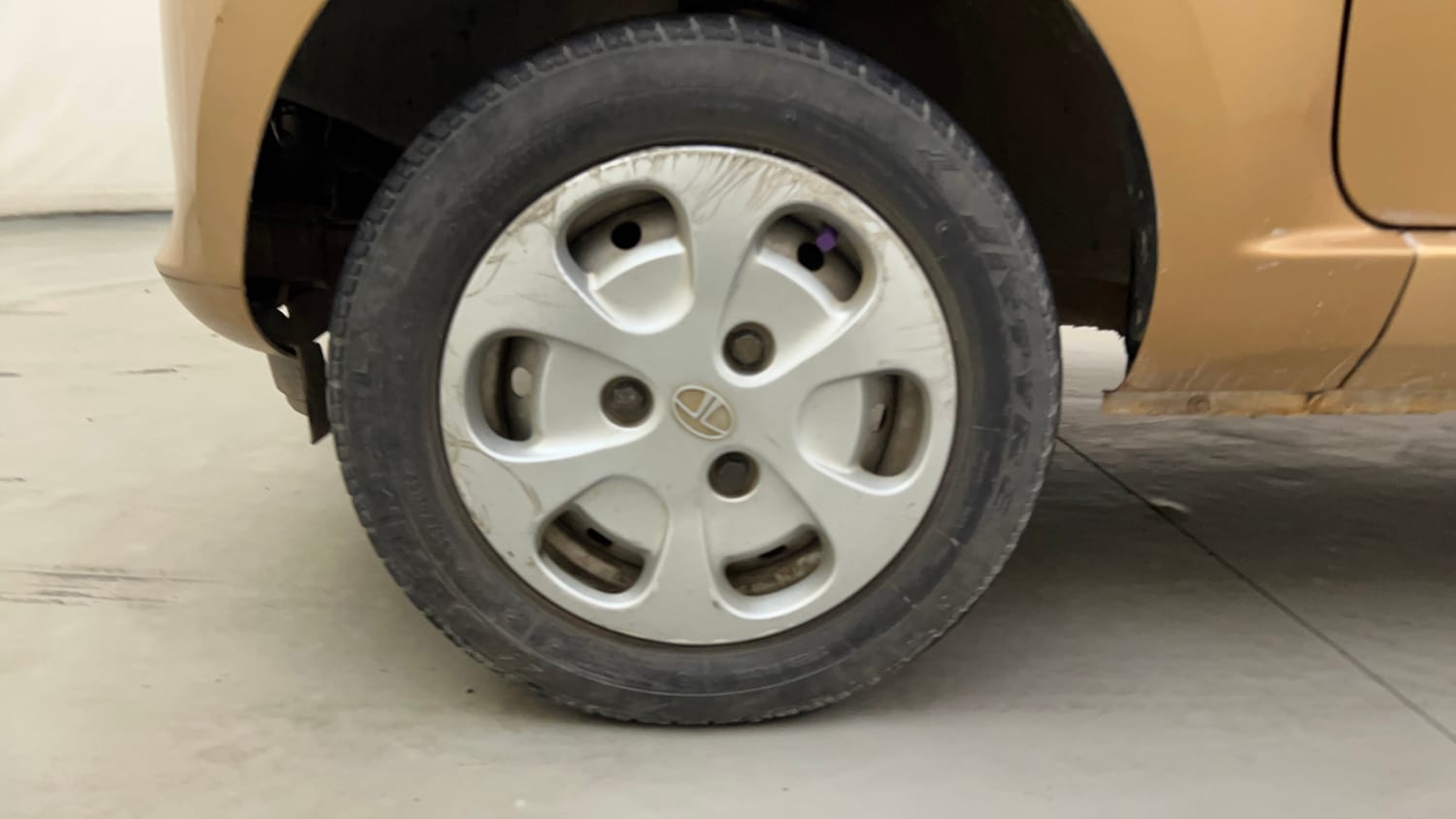 Used 2015 Tata Nano Twist XTA Petrol Automatic tyres LEFT FRONT TYRE RIM VIEW