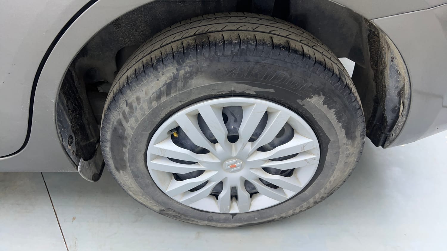 Used 2017 Maruti Suzuki Dzire VXi AMT Petrol Automatic tyres LEFT REAR TYRE RIM VIEW
